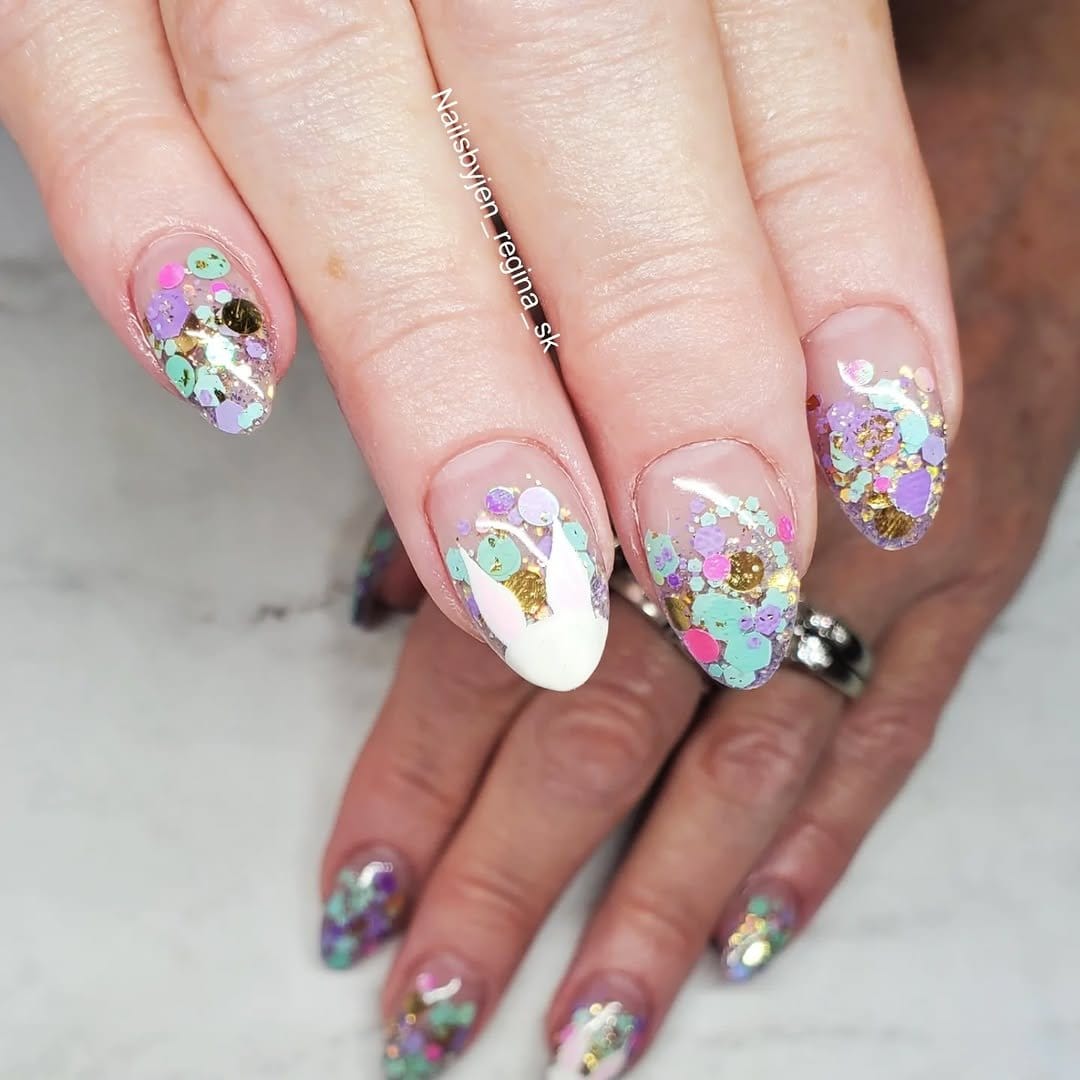 Glitter bunny ears on pastel nails