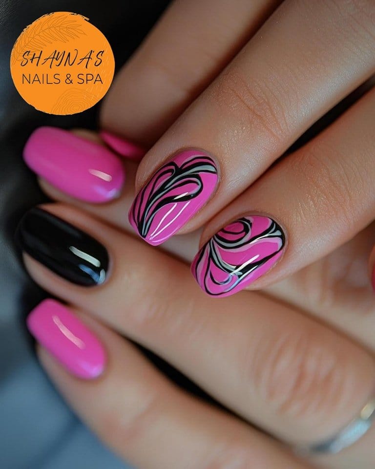 Abstract floral nail art with bold colors