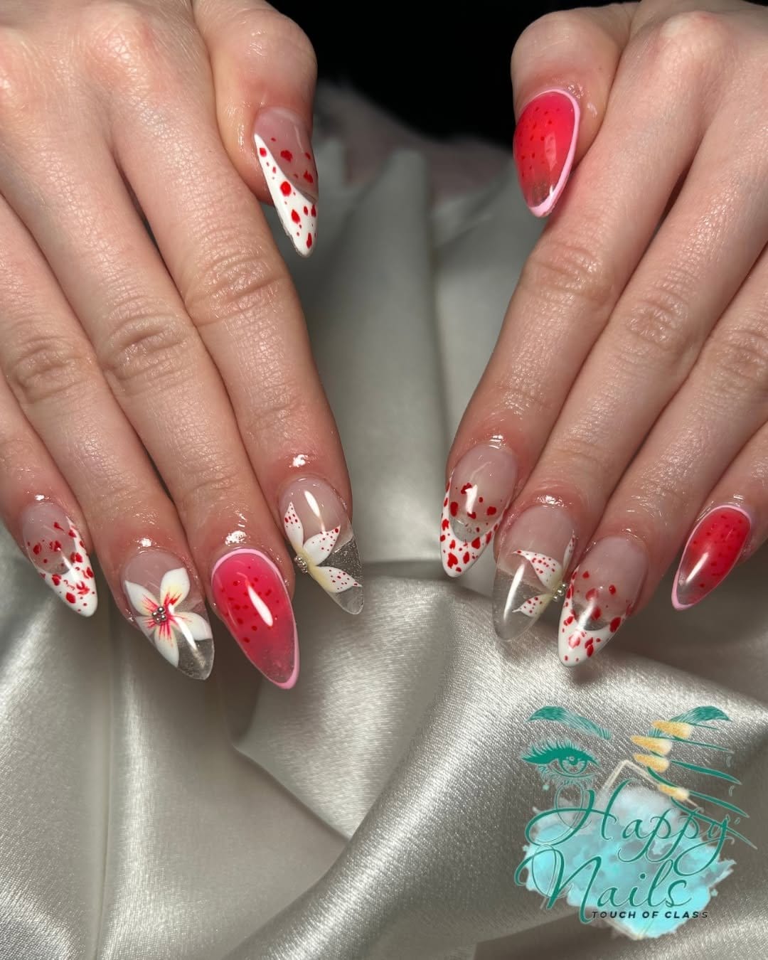 Polka dot and pink floral nail design