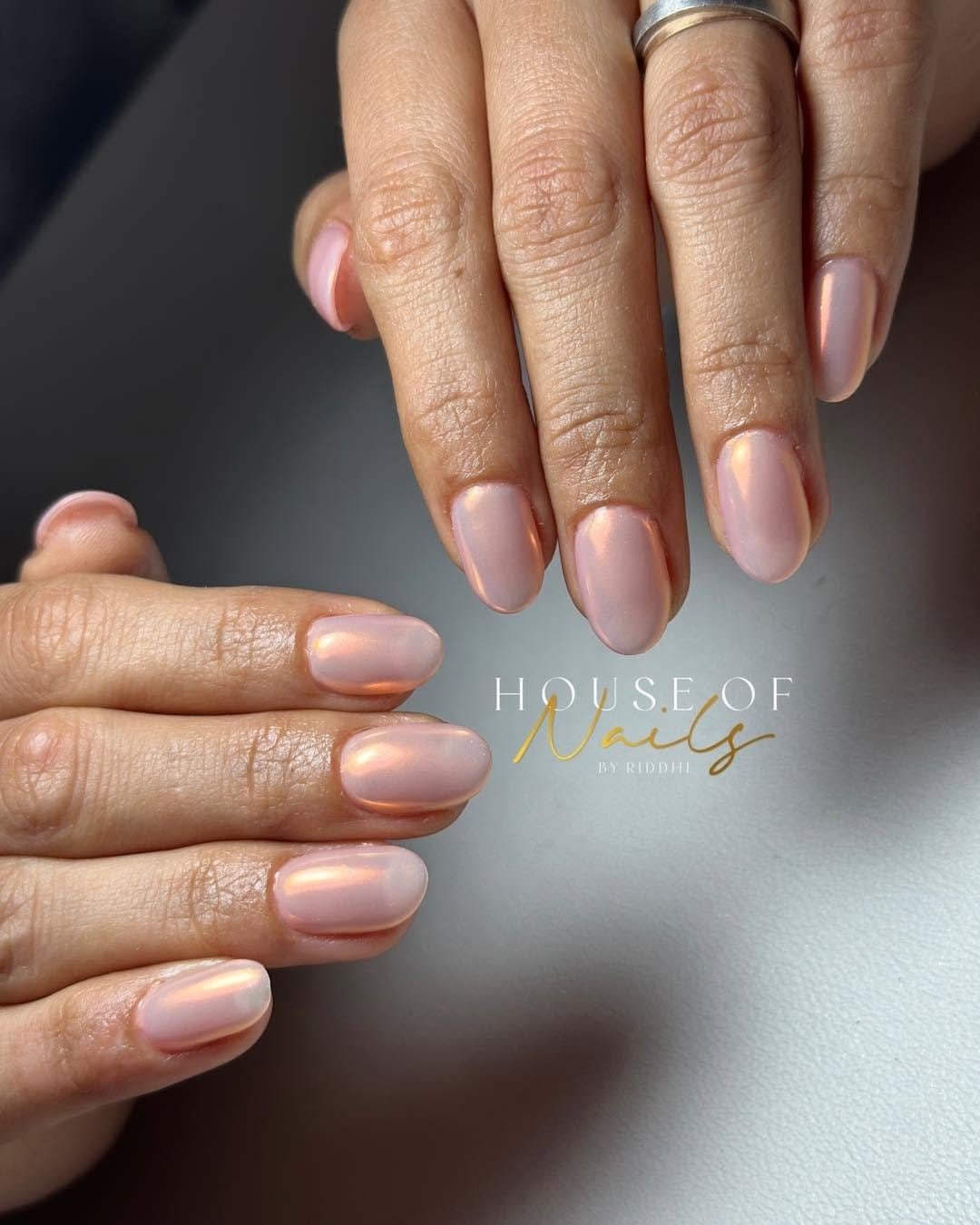 Soft peach nails with a glossy finish