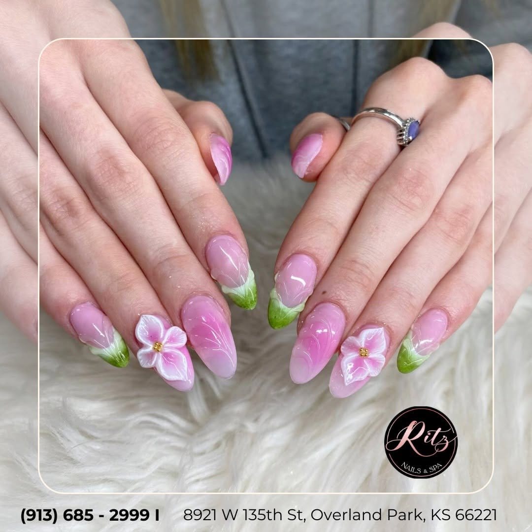 Watercolor floral designs on pastel nails
