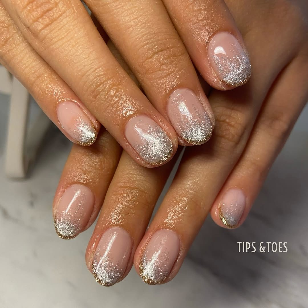 Sparkling pastel pink nails with glitter tips