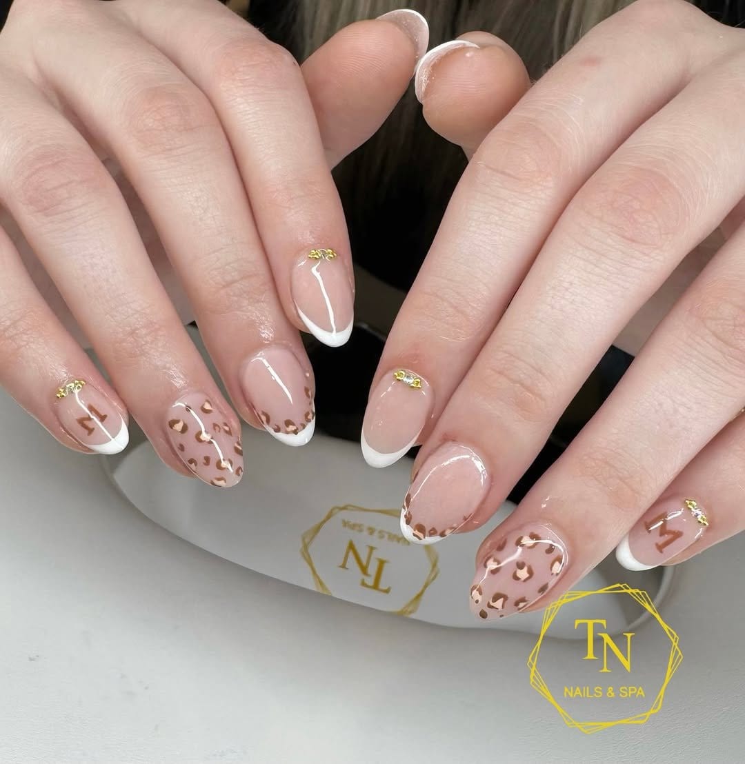 Delicate pastel feather nails
