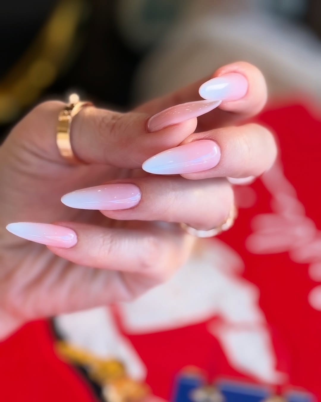 Classic red to pink ombre nails close-up