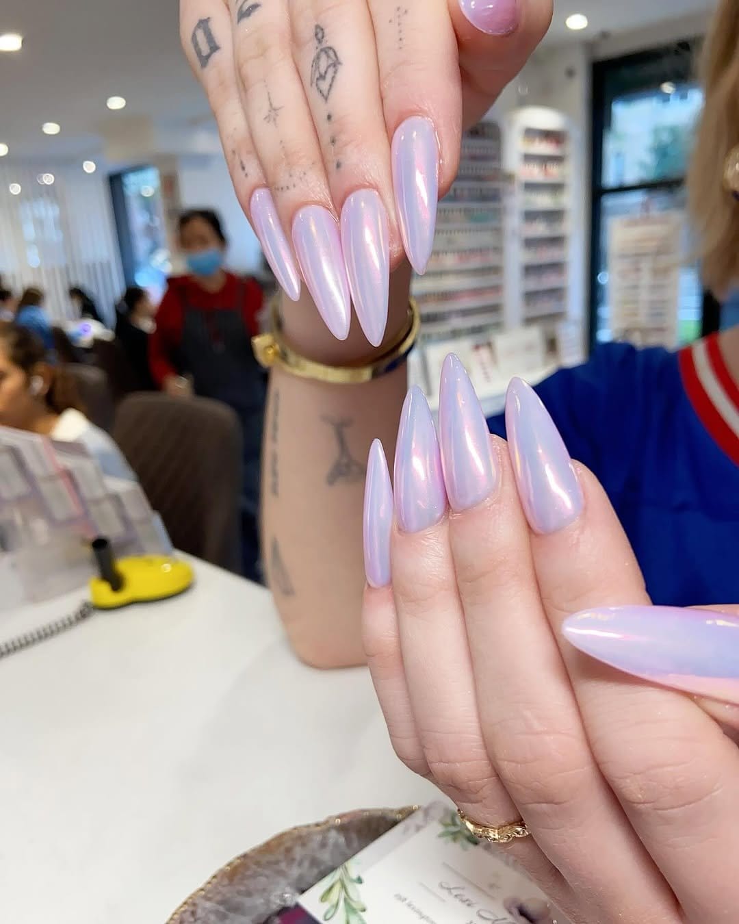 Pink ombre nails with chrome finish