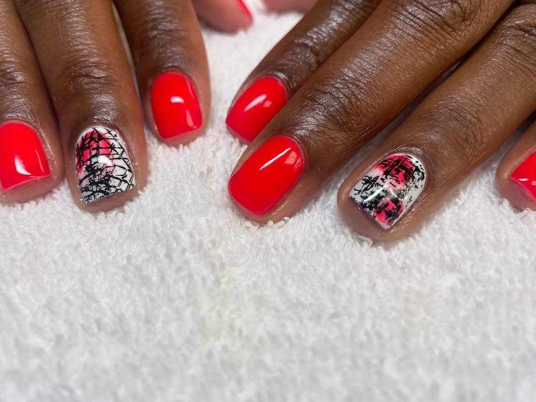 Red nails with intricate black line art