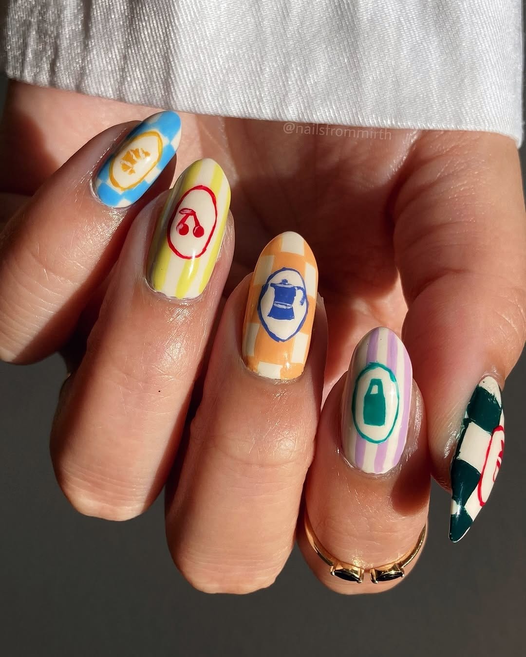 White nails with intricate crochet-inspired designs