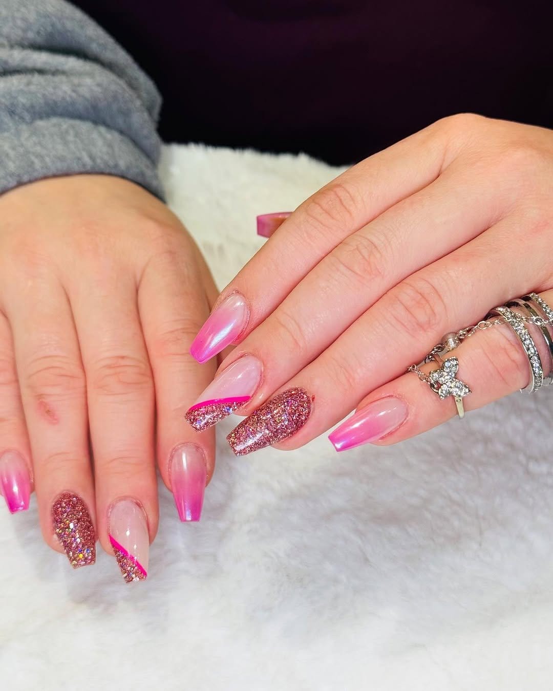 Pink ombre nails with star designs