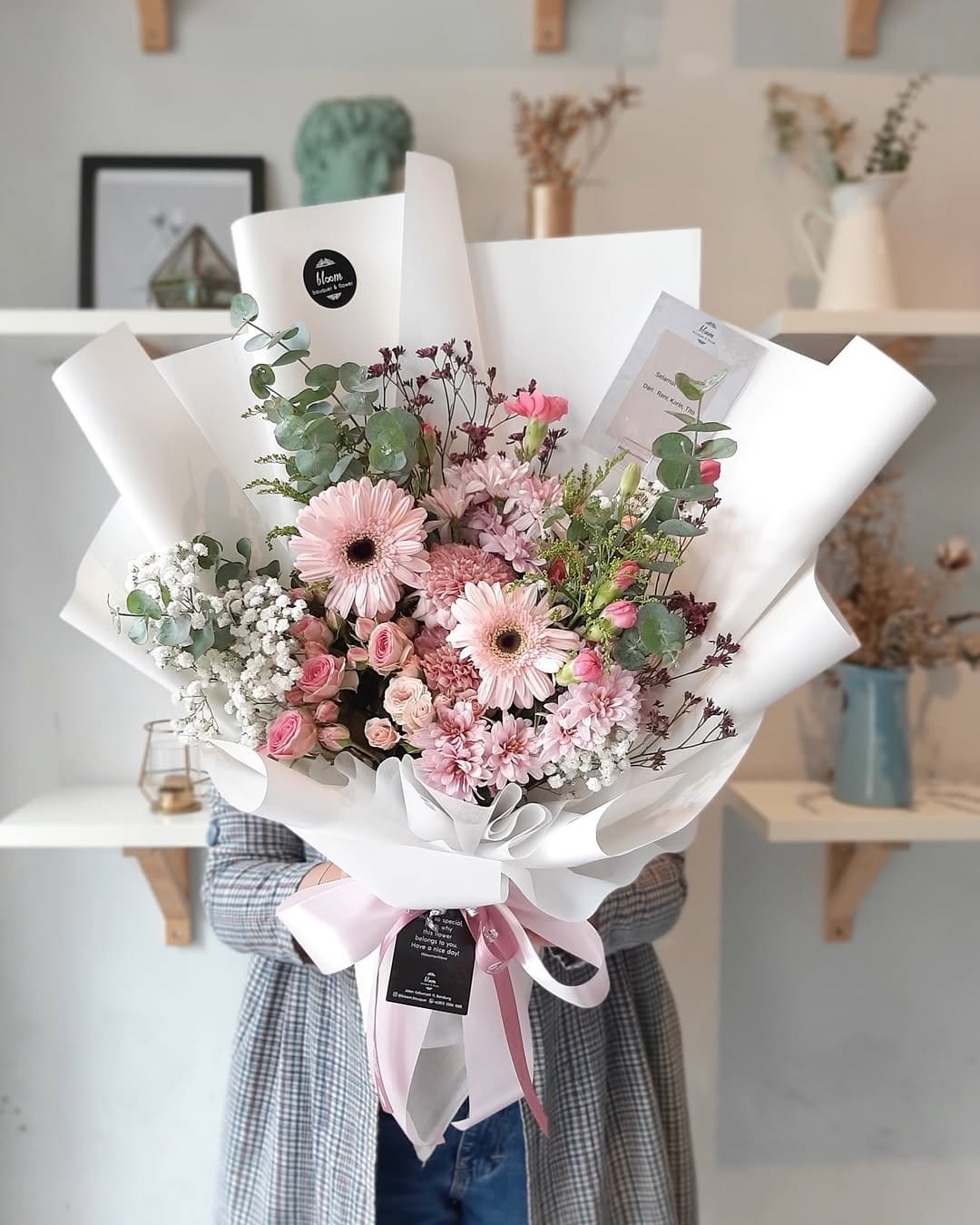 Blooming bouquet-inspired pastel nail art design