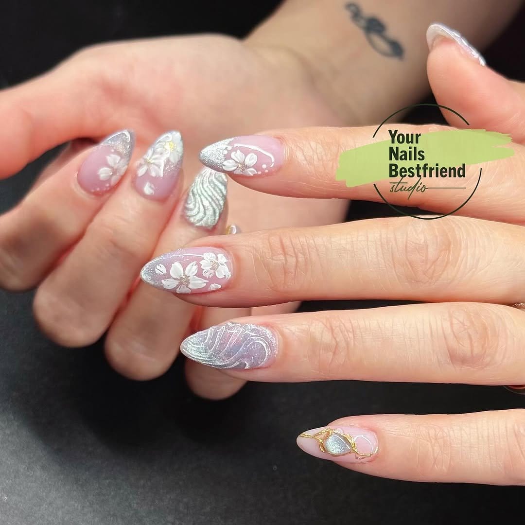 Delicate white pastel lace pattern nails