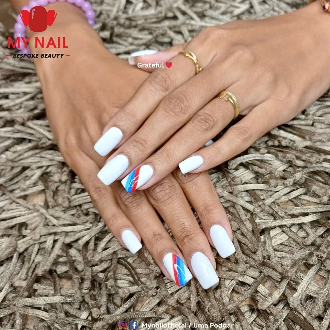 Minimalist white striped nail design
