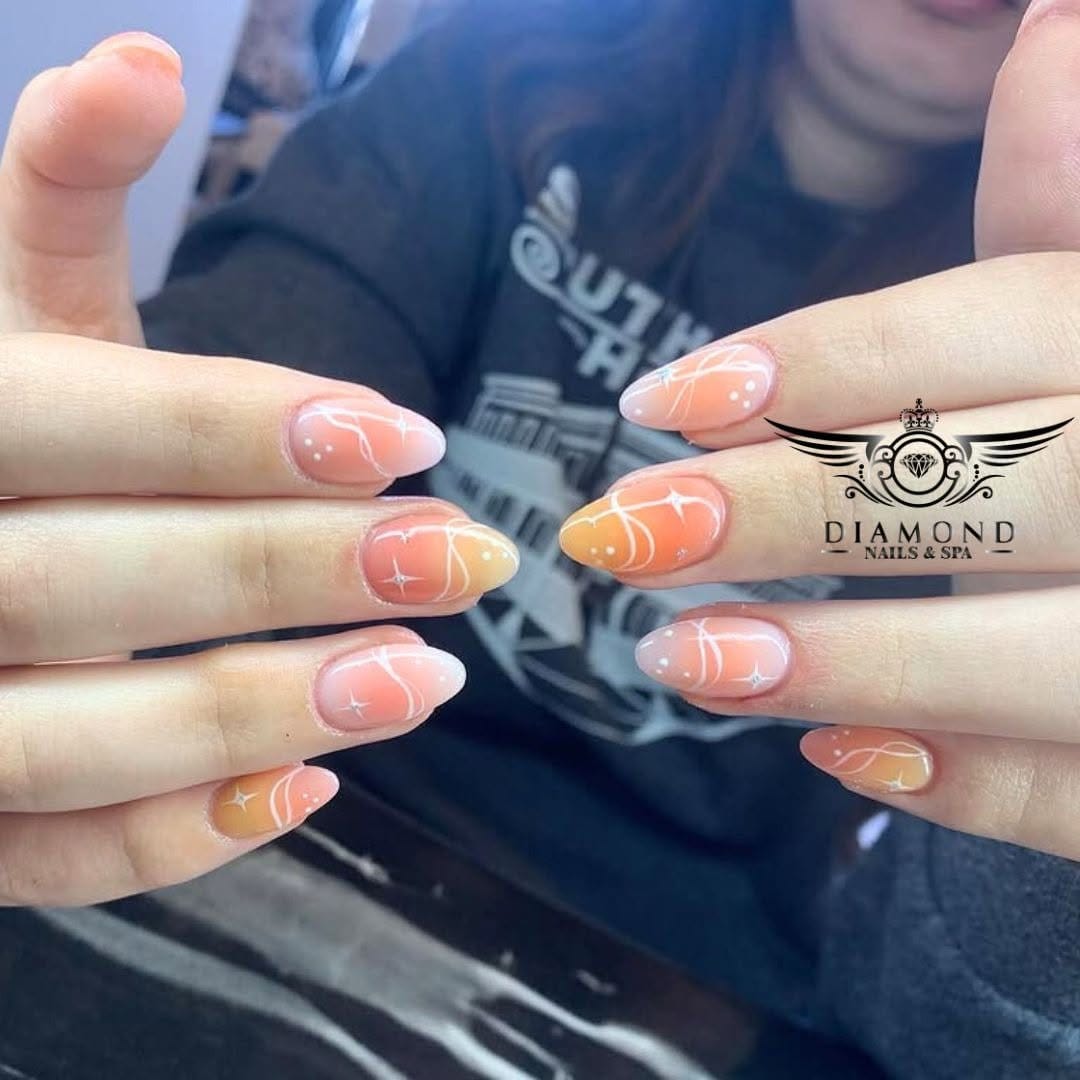 Warm peach ombre nails with a smooth gradient