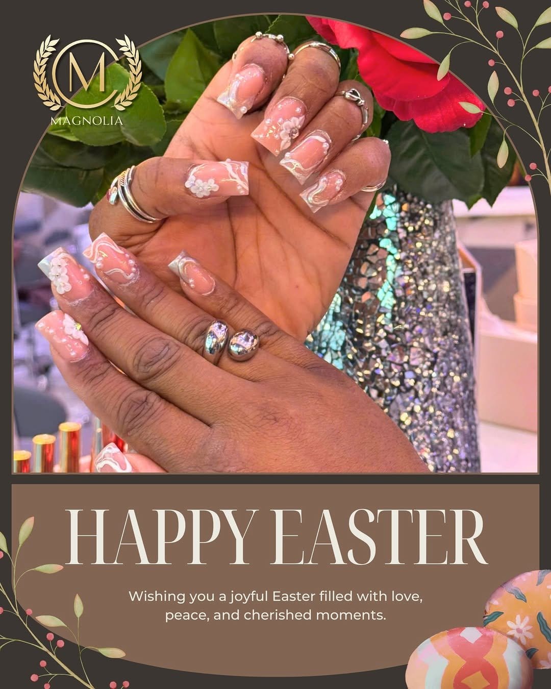 Magnolia flower nail art on a soft pink background