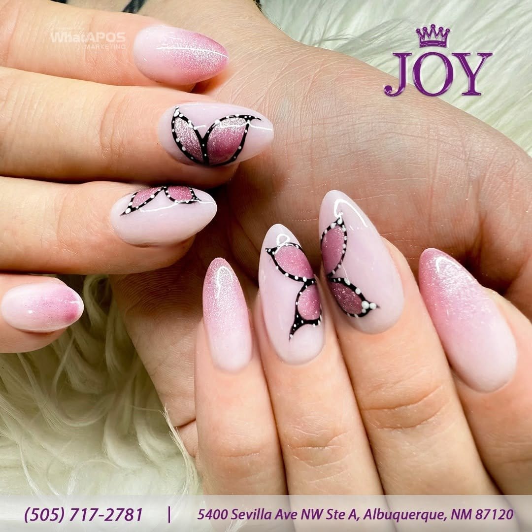 Soft lilac nails with butterfly designs