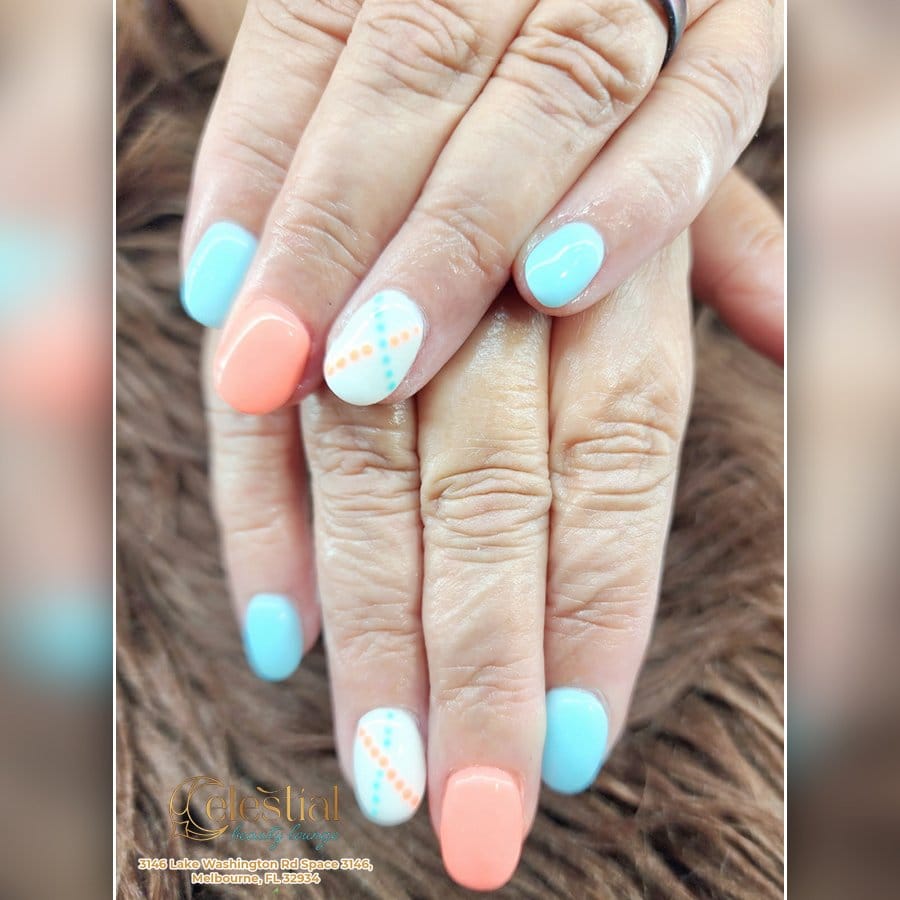 Refreshing pastel mint green ombre nails with mint leaves