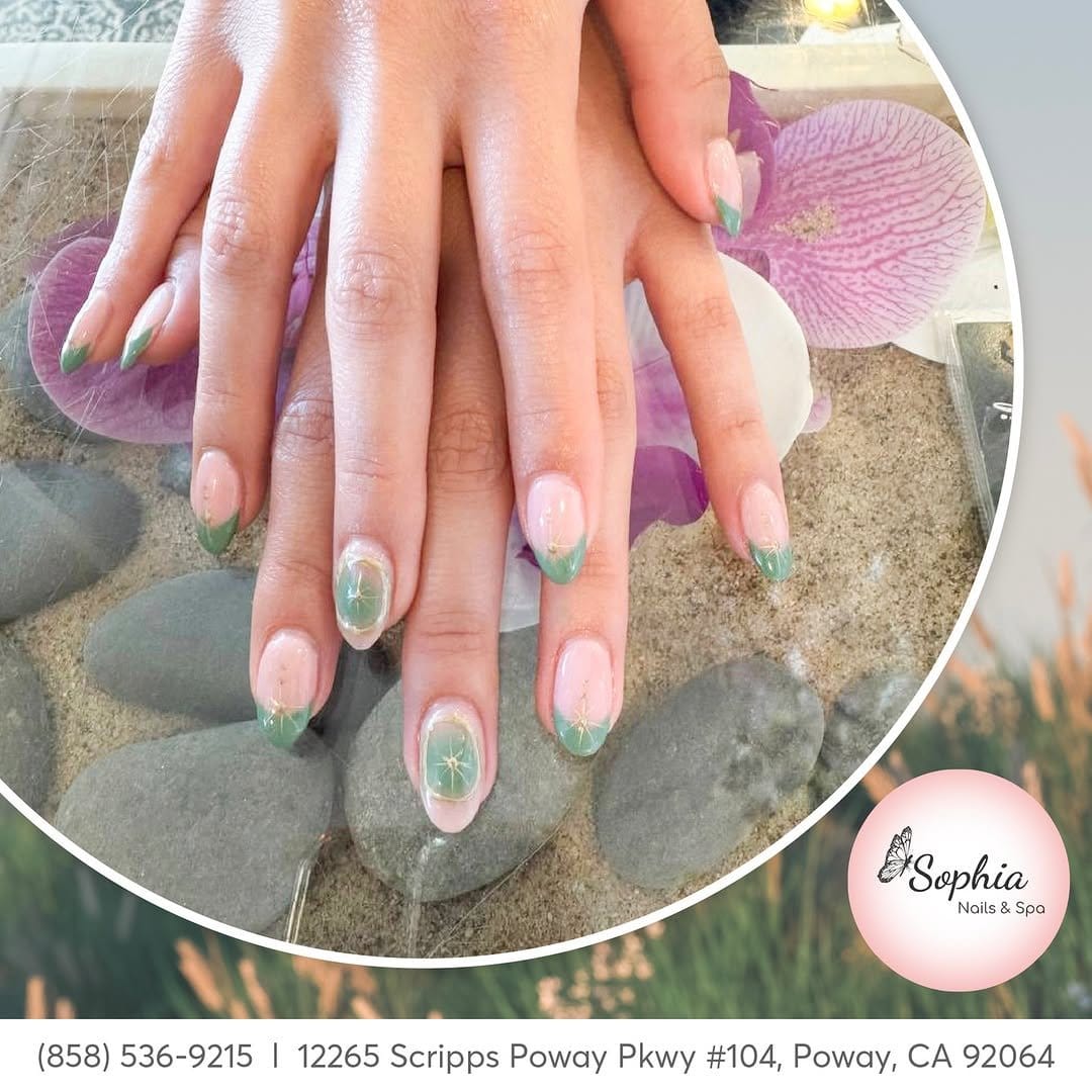 White nails with pastel polka dot accents
