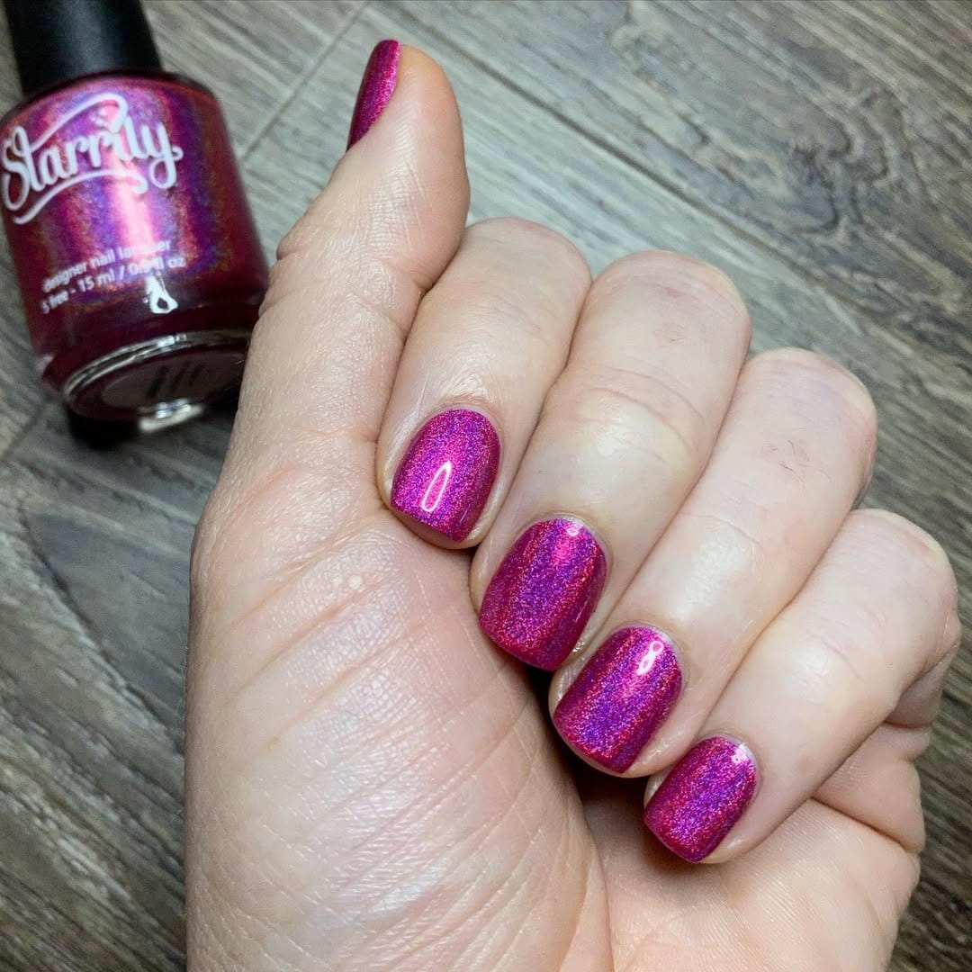 Shiny metallic hot pink nails